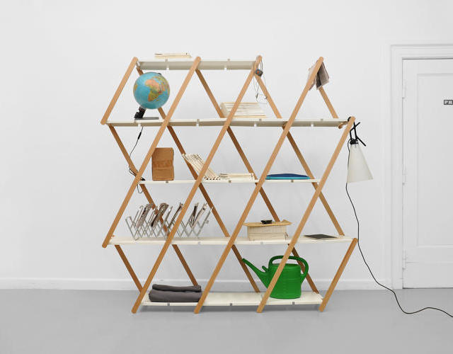 Stretchable Shelves Hold All Those Books You’ll Never Read